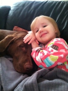 a strong relationship between a kid and her dog